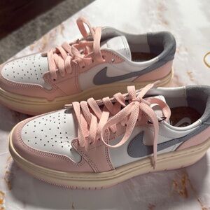Nike Pink and Gray Sneakers with Low-Top Design and Breathable Perforations